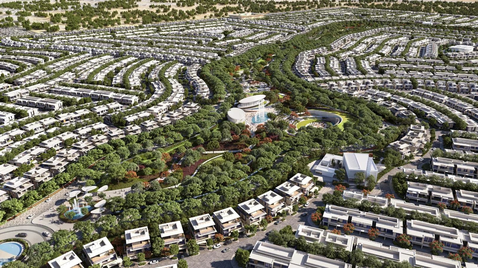 Aerial view of Azizi Florence showing curved streets of villas and townhouses around the central park